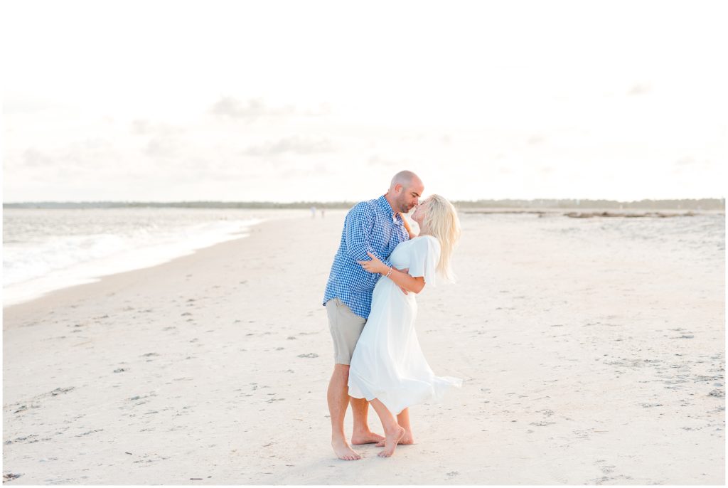 Wilmington Engagement Session couple kissing on beach