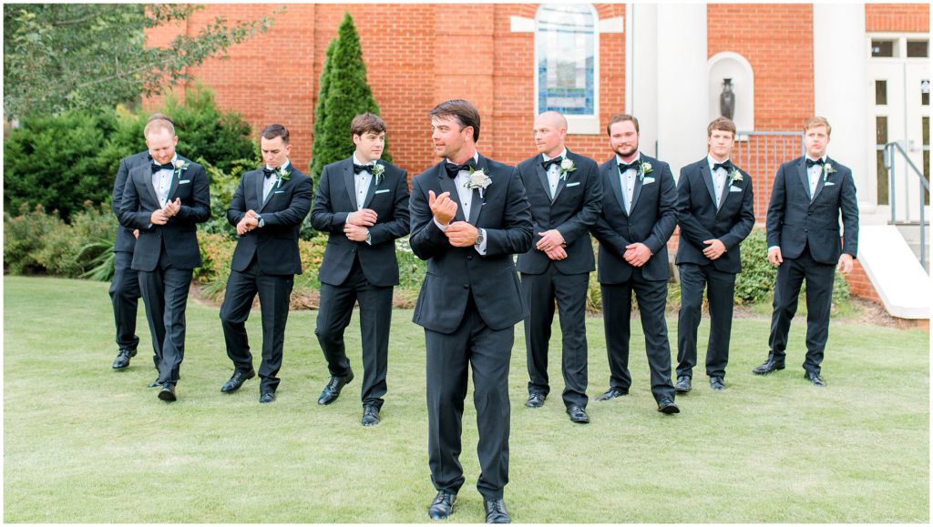 groom and groomsmen black tux 