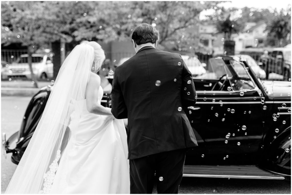 1930 plymouth vintage car wedding sendoff bubbles