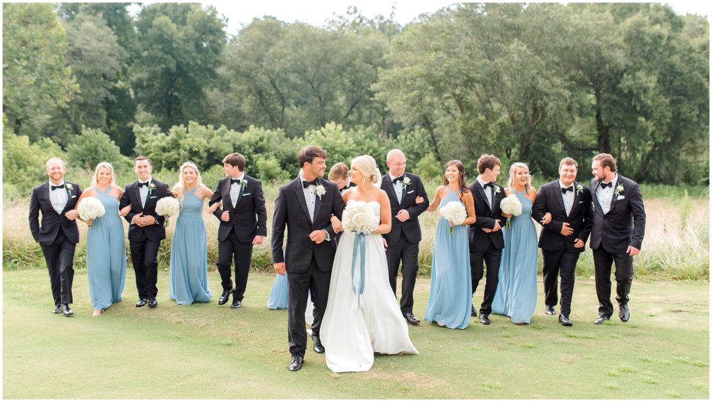 Achasta full wedding party photos with blue dresses and black tux