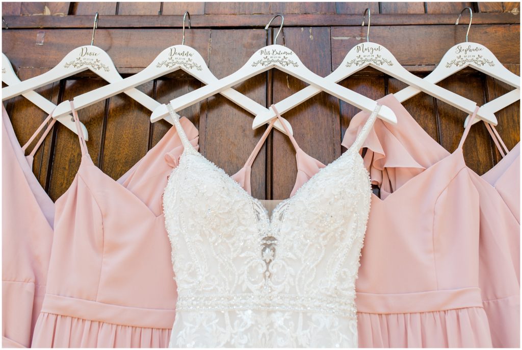 Ashton Gradens North Houston Texas Wedding bride dress and bridesmaid dresses on custom hangers