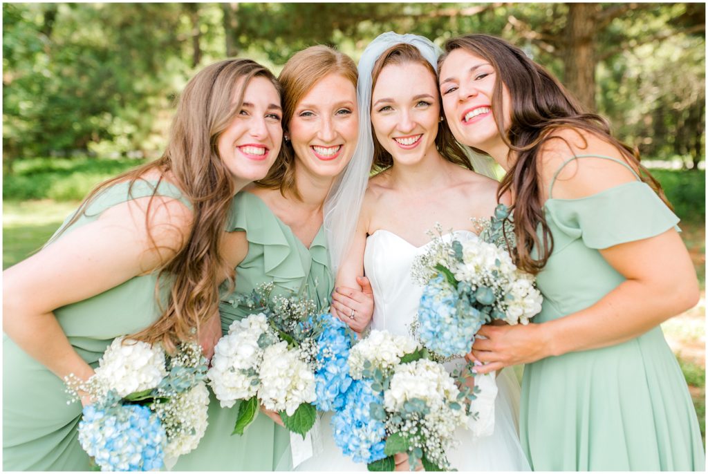 bride and bridesmaids under trees Chapel Hill, North Carolina