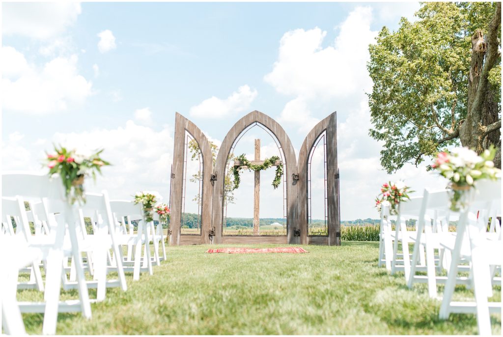 the ceremony arch and cross at the ruby cora on a sunny day