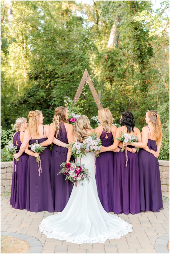 Purple Wedding florals and ceremony arch and bouquets | Ritchie Hill | by Kaitlyn Blake Photography | Fall Purple Wedding 