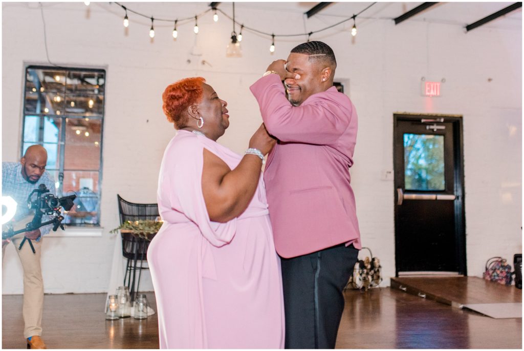 Reception Dancing Groom Emotional Dance with Mom | The Firehouse Goldsboro Wedding | by Kaitlyn Blake Photography | Fall Elegant Wedding 