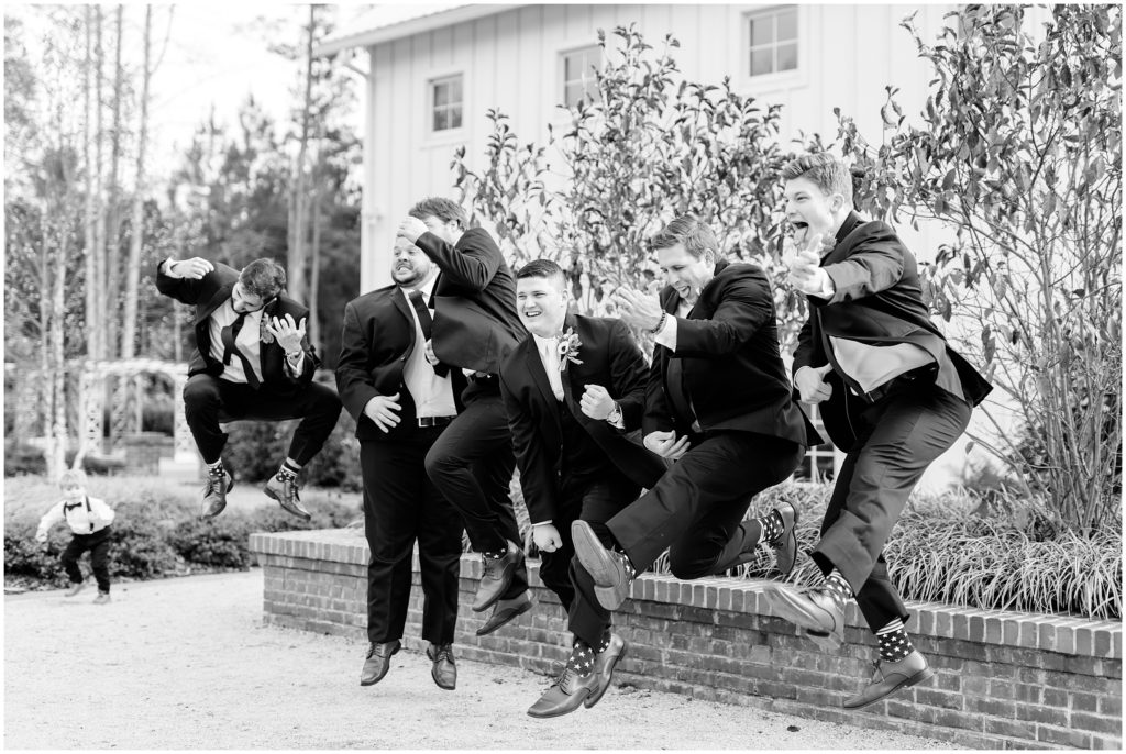 Groom and Groomsmen Navy Suits Jumping | The Barn of Chapel Hill | by Kaitlyn Blake Photography | Fall Elegant Wedding 