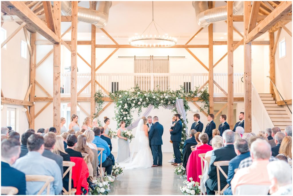 Ceremony Inside with Flower Arch | The Barn of Chapel Hill | by Kaitlyn Blake Photography | Fall Elegant Wedding 