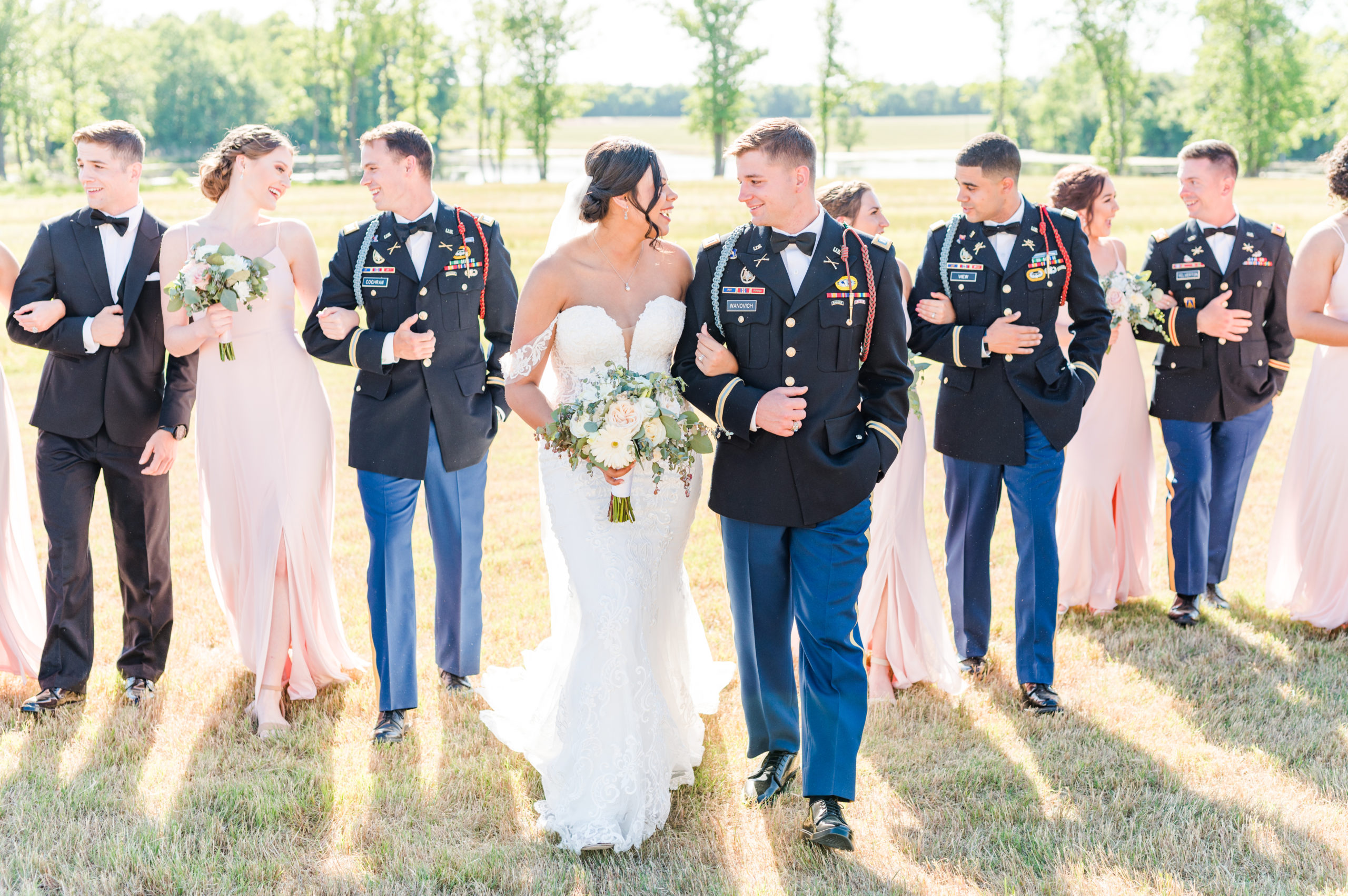 Military couple walking on their wedding day